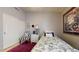 Bedroom featuring neutral tones, closet, and chair at 2845 E Calavar Rd, Phoenix, AZ 85032