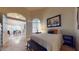 This bedroom has comfortable sleeping arrangements, lots of light, and a great artistic piece at 2845 E Calavar Rd, Phoenix, AZ 85032