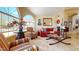 Cozy living room with natural light, stylish furniture, and decorative accents at 2845 E Calavar Rd, Phoenix, AZ 85032