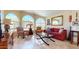 Bright living room with arched windows, comfortable seating, and tasteful decor at 2845 E Calavar Rd, Phoenix, AZ 85032