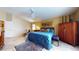 Comfortable main bedroom offers a ceiling fan and ample space at 2845 E Calavar Rd, Phoenix, AZ 85032