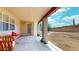 Covered patio featuring concrete flooring, backyard access, and ample space for seating at 2845 E Calavar Rd, Phoenix, AZ 85032