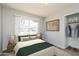 Comfortable bedroom with natural light, featuring closet space, and simple decor at 2922 S Cottonwood Dr, Tempe, AZ 85282