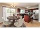 Updated kitchen next to dining area, featuring stainless appliances and a central island at 2922 S Cottonwood Dr, Tempe, AZ 85282