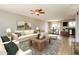 Bright living room with modern decor and seamless flow to the dining and kitchen areas at 2922 S Cottonwood Dr, Tempe, AZ 85282