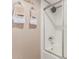 Bathroom featuring a bathtub with shower and white tile at 2941 N Oregon St # 12, Chandler, AZ 85225