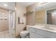 Clean bathroom with white vanity, granite countertop, and a shower-tub combination at 2941 N Oregon St # 12, Chandler, AZ 85225