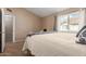 Comfortable carpeted main bedroom with an adjoining bathroom and lots of closet space at 2941 N Oregon St # 12, Chandler, AZ 85225