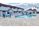 Community pool featuring lounge chairs and a pristine pool area, perfect for relaxation and leisure at 2941 N Oregon St # 12, Chandler, AZ 85225