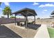 Backyard with a gazebo and pavers at 3307 W Willow Ave, Phoenix, AZ 85029