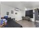 Bright bedroom with a dark ceiling fan and light-colored wood floors at 3307 W Willow Ave, Phoenix, AZ 85029