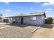 Quaint single-story home with rock landscaping, complemented by a grey exterior paint scheme at 3307 W Willow Ave, Phoenix, AZ 85029