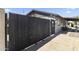 A secured gated entry providing privacy and security to the home's side yard at 3307 W Willow Ave, Phoenix, AZ 85029