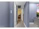 Hallway with hardwood floors leading to a bedroom at 3307 W Willow Ave, Phoenix, AZ 85029