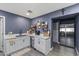 Stylish kitchen with quartz counters, modern appliances, and a beverage cooler at 3307 W Willow Ave, Phoenix, AZ 85029