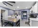 Bright kitchen with white cabinets, stainless steel appliances, and a functional island at 3307 W Willow Ave, Phoenix, AZ 85029