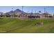 Rolling green landscape with basketball courts and ramadas at 35017 N Sacramento Wash Rd, San Tan Valley, AZ 85144