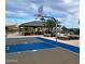 Community basketball court with shade cover and nearby picnic tables, creating a fun and comfortable recreation area at 35017 N Sacramento Wash Rd, San Tan Valley, AZ 85144
