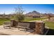 Scenic park benches in community, with green grass and mountain views at 35017 N Sacramento Wash Rd, San Tan Valley, AZ 85144