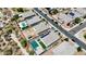 An aerial shot shows homes with backyard pools, solar panels, and manicured lawns in a community at 3529 N Brooklyn Dr, Buckeye, AZ 85396