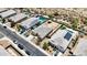 Aerial shot of homes with pools, solar panels, and artificial turf in a desert setting at 3529 N Brooklyn Dr, Buckeye, AZ 85396