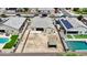 Aerial view of a house with a spacious backyard, perfect for outdoor entertaining and relaxation at 3529 N Brooklyn Dr, Buckeye, AZ 85396