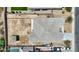 Aerial view of a house with a backyard featuring a gazebo and a spacious dirt yard, ready for customization at 3529 N Brooklyn Dr, Buckeye, AZ 85396
