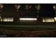 Promenade entrance sign illuminated at night, creating a welcoming and upscale impression for residents and visitors at 3551 W Mary Dr, San Tan Valley, AZ 85144