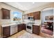 Beautiful kitchen with stainless steel appliances, tile backsplash, and a breakfast bar at 3905 S Bridal Vail Dr, Gilbert, AZ 85297
