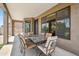 Outdoor patio featuring a table, chairs, and view of the backyard at 3905 S Bridal Vail Dr, Gilbert, AZ 85297