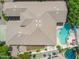 Beautiful aerial view of the home and its pool and patio, plus a manicured yard at 4121 E Patrick St, Gilbert, AZ 85295