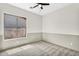 Bright bedroom with wainscoting detail and large window with view of the backyard at 4121 E Patrick St, Gilbert, AZ 85295