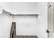 Walk-in closet featuring a rod for storage, carpet flooring and neutral walls at 4121 E Patrick St, Gilbert, AZ 85295