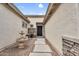 Inviting front entrance with a fountain, stone accents, and desert landscaping at 4121 E Patrick St, Gilbert, AZ 85295