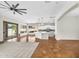 Bright living area with pool views, tile flooring, recessed lighting, and open floor plan at 4121 E Patrick St, Gilbert, AZ 85295