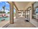Spacious covered patio with a view of the pool, and an outdoor kitchen at 4121 E Patrick St, Gilbert, AZ 85295