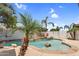 Beautiful pool with lush tropical landscaping, rock accents, and a serene atmosphere at 4121 E Patrick St, Gilbert, AZ 85295
