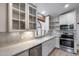 Stylish kitchen featuring stainless steel appliances and granite countertops at 4443 W Escuda Dr, Glendale, AZ 85308