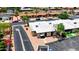 Aerial view of a residential community with well-maintained homes, mature trees, and a peaceful neighborhood atmosphere at 4501 E Carol Ave # 77, Mesa, AZ 85206