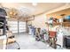 Spacious garage with ample storage, organization, and overhead lighting at 4501 E Carol Ave # 77, Mesa, AZ 85206
