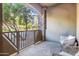 Balcony with outdoor seating offers a serene view of the surrounding community and lush greenery at 5450 E Deer Valley Dr # 1004, Phoenix, AZ 85054
