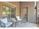 Cozy balcony with comfortable seating, perfect for relaxing and enjoying the outdoors at 5450 E Deer Valley Dr # 1004, Phoenix, AZ 85054