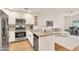 Stylish kitchen featuring stainless steel appliances, granite countertops, and open layout at 5450 E Deer Valley Dr # 1004, Phoenix, AZ 85054