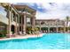 Inviting community pool with sun loungers and umbrellas, offering a perfect spot for relaxation and recreation at 5450 E Deer Valley Dr # 1004, Phoenix, AZ 85054