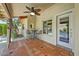 Charming patio features a tile floor, seating, and bar table that overlooks the sparkling pool at 5710 E Anderson Dr, Scottsdale, AZ 85254