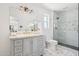 Stylish bathroom with marble countertop, designer fixtures, and a glass-enclosed shower at 7049 E Latham St, Scottsdale, AZ 85257