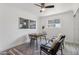 Office with a modern desk, comfortable chairs, neutral color palette, and window views at 7049 E Latham St, Scottsdale, AZ 85257