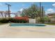 A refreshing private pool surrounded by lush greenery in a serene backyard setting at 7049 E Latham St, Scottsdale, AZ 85257