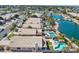 Stunning aerial view highlighting a community with lake access and private pools at 7140 E Juanita Ave, Mesa, AZ 85209