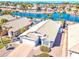 Beautiful waterfront property with a private pool and well-manicured landscaping at 7140 E Juanita Ave, Mesa, AZ 85209
